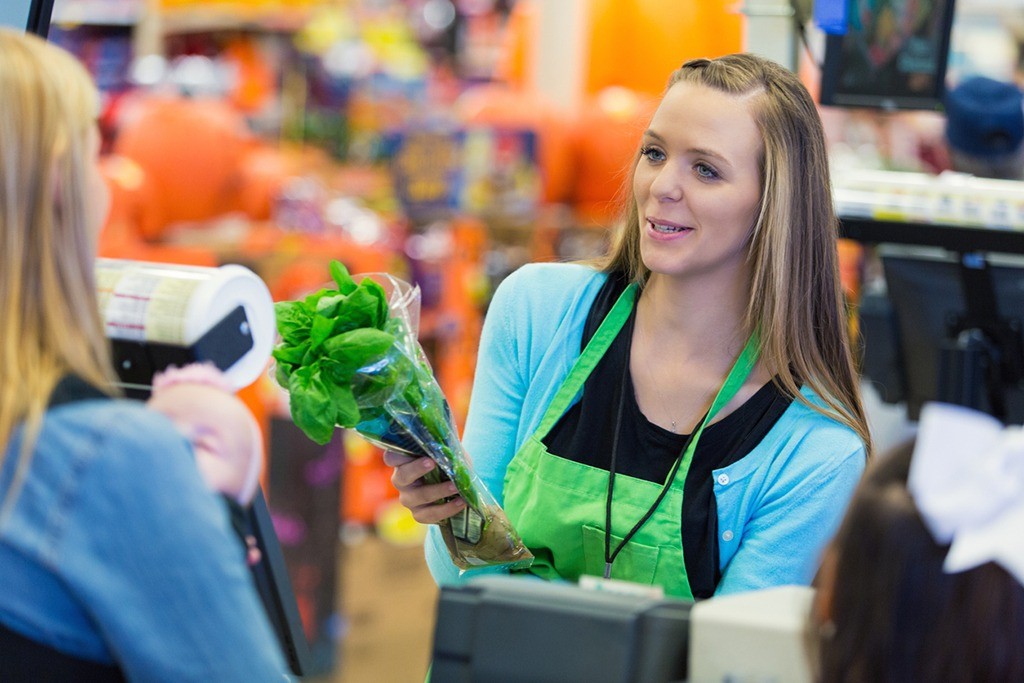 Image of Store Clerk Representing Optimized Usage of Labor